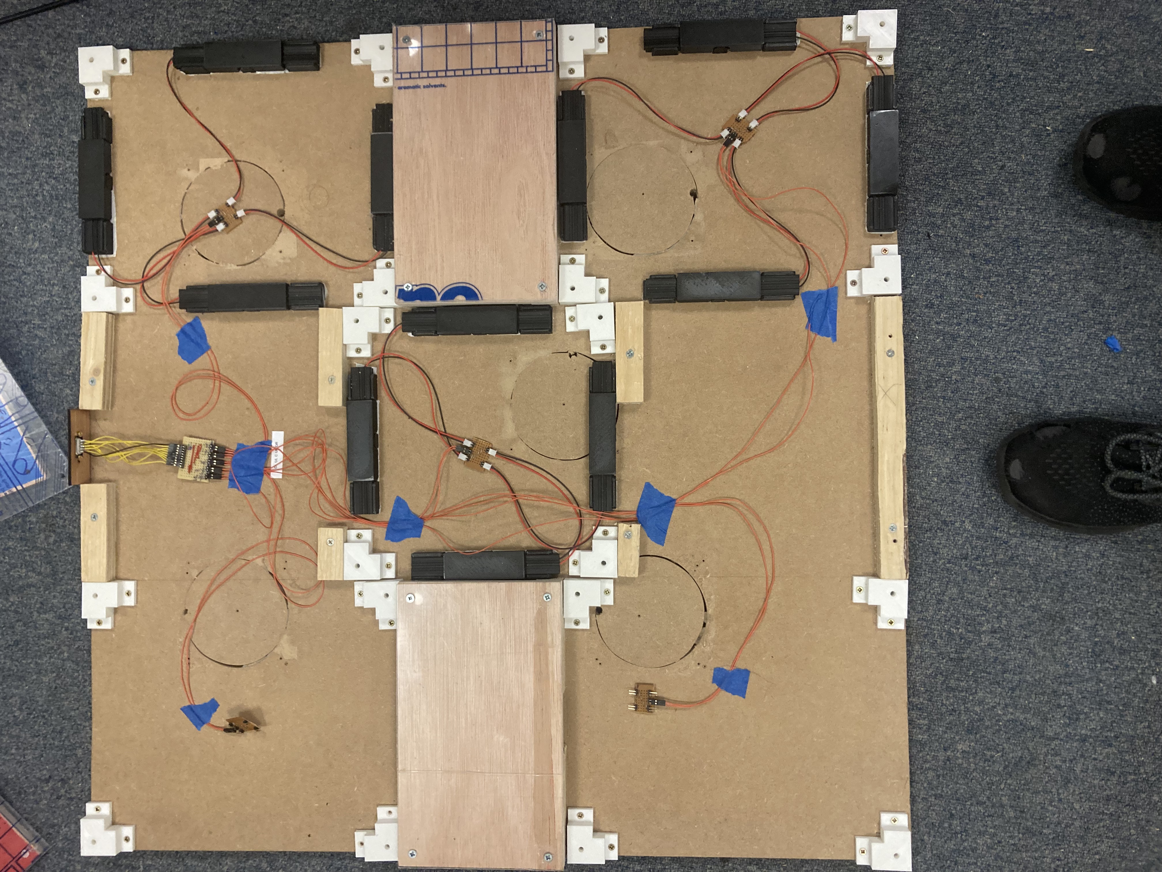 internals of a DIY dance pad with wiring in place